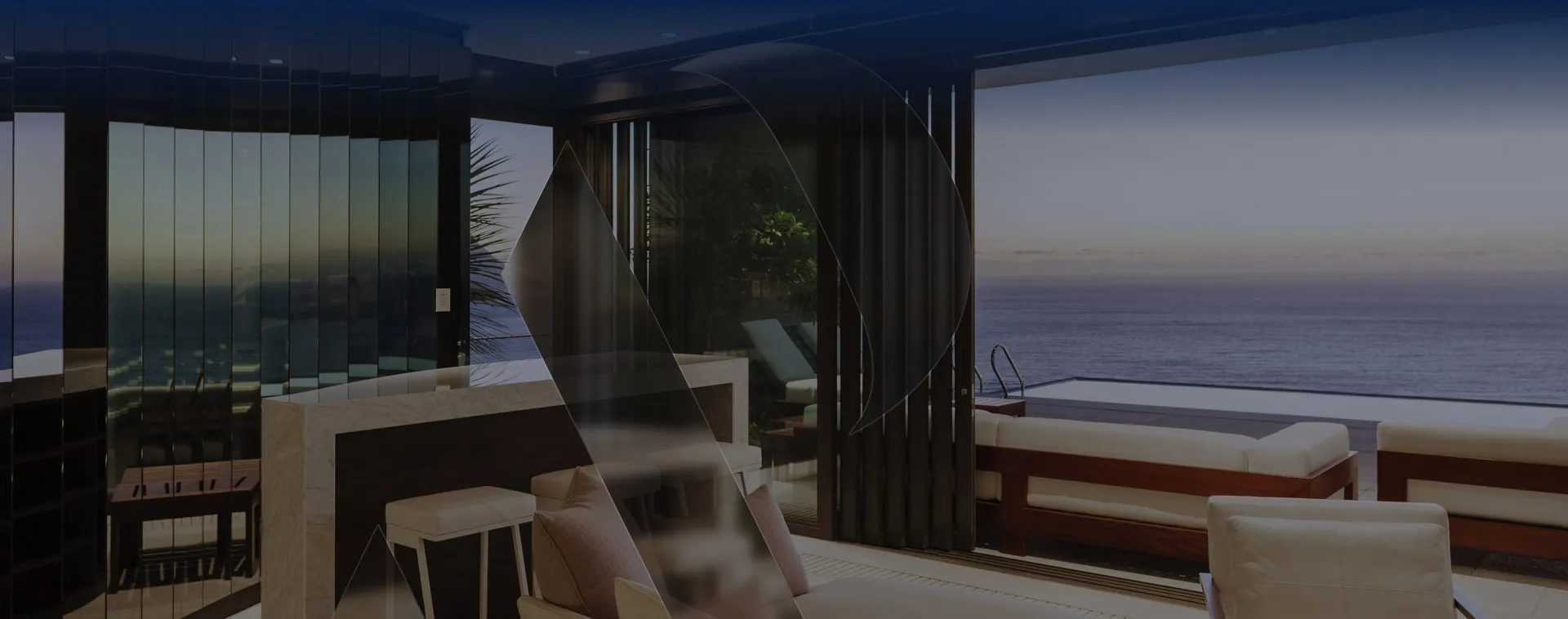Luxury waterfront villa terrace overlooking the sea in Dubai at sunset — real estate market analytics by AP2 Real Estate